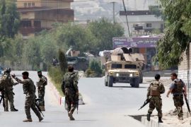 Afghan National Army (ANA) soldiers arrive at the site of gunfire and attack in Jalalabad city, Afghanistan July 11, 2018. REUTERS/Parwiz
