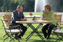 German Chancellor Angela Merkel and Russian President Vladimir Putin speak during their meeting at the German government guest house Meseberg Palace in Gransee, Germany August 18, 2018. Sputnik/Alexei Druzhinin/Kremlin via REUTERS ATTENTION EDITORS - THIS IMAGE WAS PROVIDED BY A THIRD PARTY.
