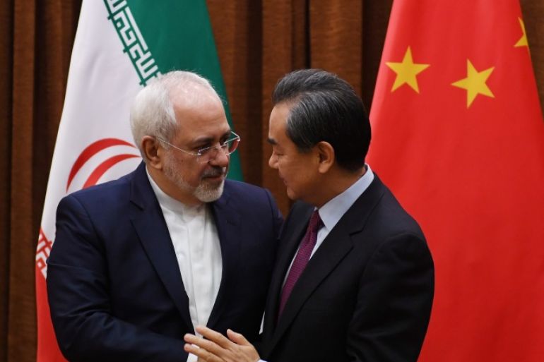 ميدان - وزيرا الخارجية الصيني والإيراني