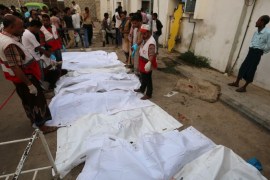 ATTENTION EDITORS - VISUAL COVERAGE OF SCENES OF DEATH Bodies of people killed by an air strike on a fish market are laid out in plastic bags at a hospital in Hodeidah, Yemen August 2, 2018. REUTERS/Abduljabbar Zeyad
