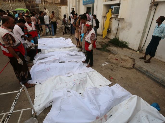 ATTENTION EDITORS - VISUAL COVERAGE OF SCENES OF DEATH Bodies of people killed by an air strike on a fish market are laid out in plastic bags at a hospital in Hodeidah, Yemen August 2, 2018. REUTERS/Abduljabbar Zeyad