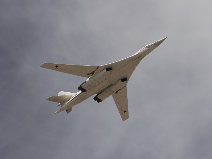 A Tupolev Tu-160 Blackjack strategic bomber flies over the Red Square during the Victory Day parade in Moscow, Russia, May 9, 2015. Russia marks the 70th anniversary of the end of World War Two in Europe on Saturday with a military parade, showcasing new military hardware at a time when relations with the West have hit lows not seen since the Cold War. REUTERS/Host Photo Agency/RIA Novosti ATTENTION EDITORS - THIS IMAGE HAS BEEN SUPPLIED BY A THIRD PARTY. IT IS DISTRIBUTED, EXACTLY AS RECEIVED BY REUTERS, AS A SERVICE TO CLIENTS