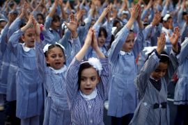 Palestinian schoolgirls participate in the morning exercise at an UNRWA-run school, on the first day of a new school year, in Gaza City August 29, 2018. REUTERS/Mohammed Salem
