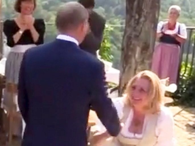Austria's Foreign Minister Karin Kneissl dances with Russia's President Vladimir Putin at her wedding in Gamlitz, Austria, August 18, 2018 in this picture grab taken from video. Picture taken August 18, 2018. REUTERS TV via REUTERS