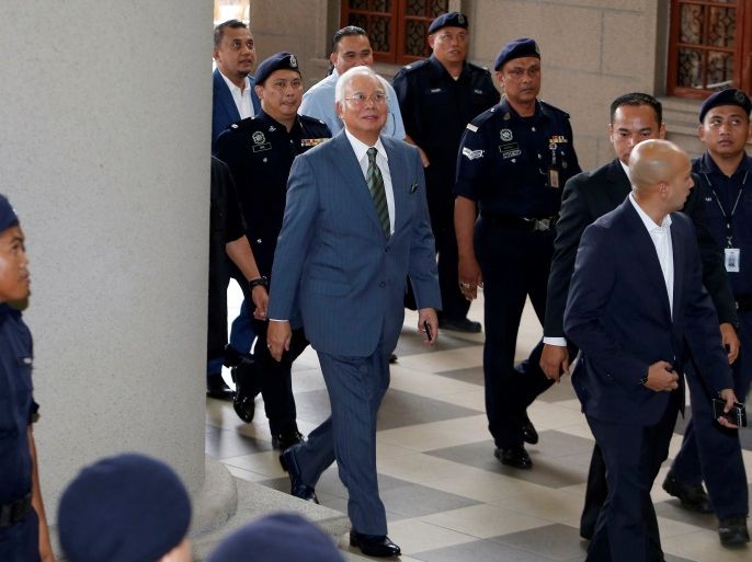 Malaysia's former Prime Minister Najib Razak arrives in court in Kuala Lumpur, Malaysia August 8, 2018. REUTERS/Lai Seng Sin