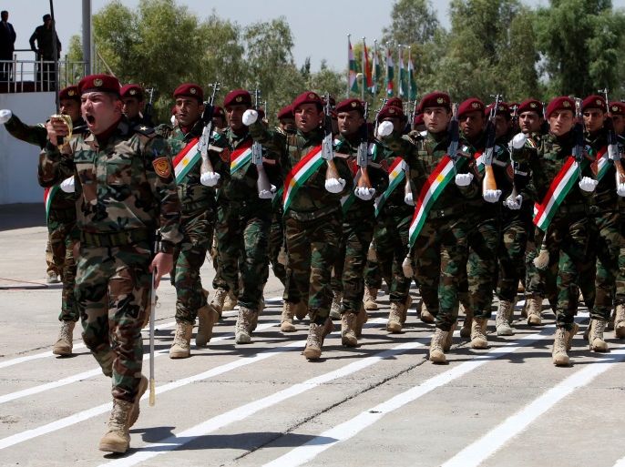 Members of the Peshmerga Zirvani commandos march during their graduation ceremony at the Tiger training camp in Erbil, Iraq August 16, 2018. REUTERS/Azad Lashkari