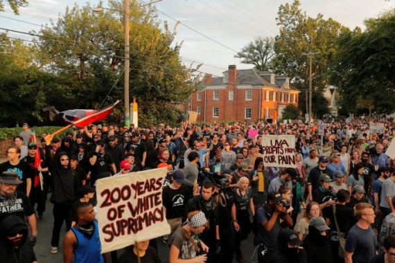 Protesters march at the University of Virginia, ahead of the one year anniversary of the 2017 Charlottesville