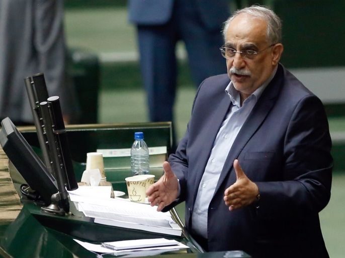 Iranian Economy and Finance Minister Masoud Karbasian (R) speaks to defend himself during an impeachment session at the Iranian Parliament in Tehran, Iran, 26 August 2018. Media reported that parliament sacked Karbasian as Minister of Economy and Finance as Iran is facing an economic crisis. The parliament impeached Economy Minister Masoud Karbasian and on the day voted to sack him. EPA-EFE/ABEDIN TAHERKENAREH