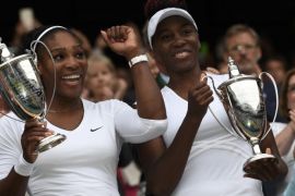Britain Tennis - Wimbledon - All England Lawn Tennis & Croquet Club, Wimbledon, England - 9/7/16 USA's Serena Williams and Venus Williams celebrate winning their womens doubles final against Hungary's Timea Babos and Kazakhstan's Yaroslava Shvedova with the trophies REUTERS/Tony O'Brien Picture Supplied by Action Images