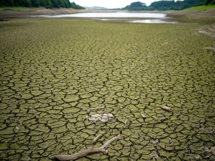 BOLTON, ENGLAND - JULY 23: The dried up bed of Wayoh Reservoir near Bolton as the heatwave continues across the UK on July 23, 2018 in Bolton, England. A hosepipe ban in the North West of England will come in to force on August 5th, as the reservoirs serving millions of customers become depleted. (Photo by Christopher Furlong/Getty Images)