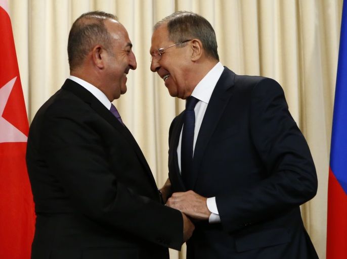 Russia's Foreign Minister Sergei Lavrov meets with his Turkish counterpart Mevlut Cavusoglu in Moscow, Russia, March 14, 2018. REUTERS/Sergei Karpukhin