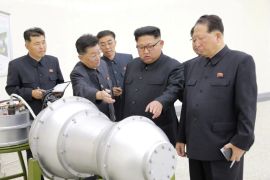 REFILE - ADDITIONAL INFORMATION North Korean leader Kim Jong Un provides guidance with Ri Hong Sop (2nd L) and Hong Sung Mu (R) on a nuclear weapons program in this undated photo released by North Korea's Korean Central News Agency (KCNA) in Pyongyang September 3, 2017. KCNA via REUTERS ATTENTION EDITORS - THIS PICTURE WAS PROVIDED BY A THIRD PARTY. REUTERS IS UNABLE TO INDEPENDENTLY VERIFY THE AUTHENTICITY, CONTENT, LOCATION OR DATE OF THIS IMAGE. NOT FOR SALE FO