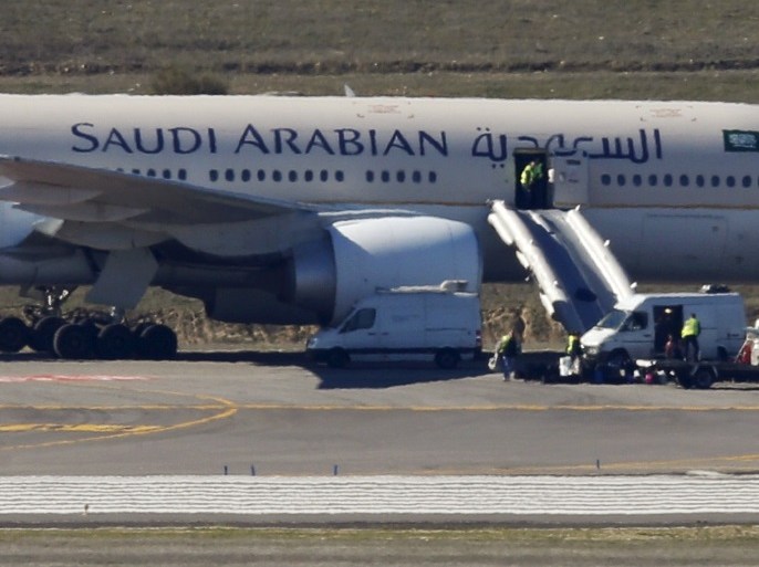 Saudi Arabian Airlines flight SVA 226 is isolated on the tarmac after its passengers and crew were evacuated following a bomb threat, at the Barajas airport in Madrid, Spain, February 4, 2016. REUTERS/Sergio Perez TPX IMAGES OF THE DAY