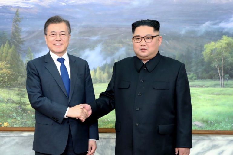 South Korean President Moon Jae-in shakes hands with North Korean leader Kim Jong Un during their summit at the truce village of Panmunjom, North Korea, in this handout picture provided by the Presidential Blue House on May 26, 2018. Picture taken on May 26, 2018. The Presidential Blue House /Handout via REUTERS ATTENTION EDITORS - THIS IMAGE WAS PROVIDED BY A THIRD PARTY