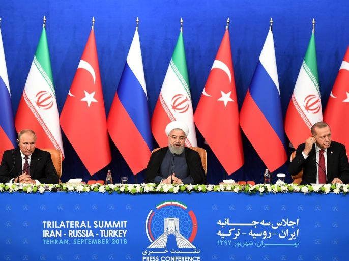 President Vladimir Putin of Russia, Hassan Rouhani of Iran and Tayyip Erdogan of Turkey attend a news conference following their meeting in Tehran, Iran September 7, 2018. Kirill Kudryavtsev/Pool via REUTERS