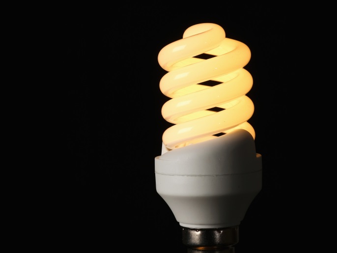LONDON, UNITED KINGDOM - OCTOBER 17: A photo illustration of an energy saving lightbulb on October 17, 2013 in London, England. British Gas, who supply energy to almost eight million households in the UK, have announced price increases of at least 8.4% which will come into effect on November 23, 2013. (Photo by Dan Kitwood/Getty Images)