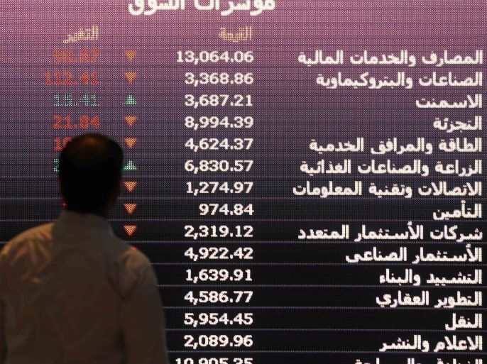 An investor monitors a screen displaying stock information at the Saudi Stock Exchange (Tadawul) in Riyadh, Saudi Arabia January 18, 2016. REUTERS/Faisal Al Nasser