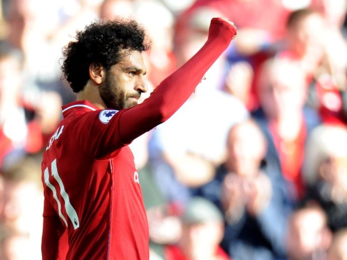 Soccer Football - Premier League - Liverpool v Brighton & Hove Albion - Anfield, Liverpool, Britain - August 25, 2018 Liverpool's Mohamed Salah celebrates scoring their first goal REUTERS/Peter Powell EDITORIAL USE ONLY. No use with unauthorized audio, video, data, fixture lists, club/league logos or