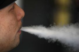 SOUTH SAN FRANCISCO, CA - JANUARY 23: Jeremy Wong blows vapor from an e-cigarette at The Vaping Buddha on January 23, 2018 in South San Francisco, California. According to a 600 page report by the National Academy of Sciences, Engineering and Medicine, vaping was found to be far less hazardous than smoking. Justin Sullivan/Getty Images/AFP== FOR NEWSPAPERS, INTERNET, TELCOS & TELEVISION USE ONLY ==