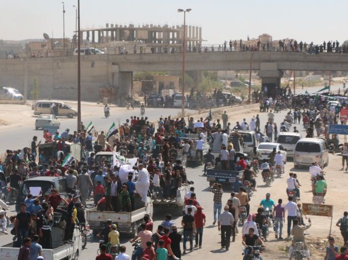 Protest in Idlib- - IDLIB, SYRIA - AUGUST 31 : Syrian oppositions demanding Turkey to prevent attacks on Idlib, chant slogans as they protest against regime forces' possible attacks in Syria's Idlib province on August 31, 2018.