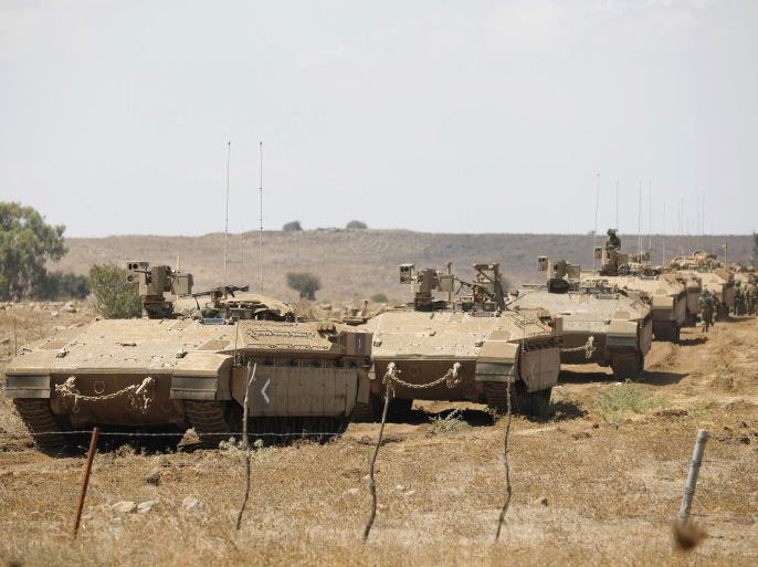 Israeli armoured vehicles take part in a army drill after the visit of Israeli Defence Minister Avigdor Lieberman in the Israeli-occupied Golan Heights, Israel, August 7, 2018. REUTERS/Amir Cohen