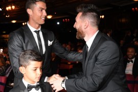 epa06284903 Argentine and Barcelona forward Lionel Messi (R) greets Portugal and Real Madrid forward Cristiano Ronaldo and his son Cristiano Ronaldo Jr. before the start of the Best FIFA Football Awards 2017 at the London Palladium, London, Britain 23 October 2017. EPA-EFE/ANDY RAIN
