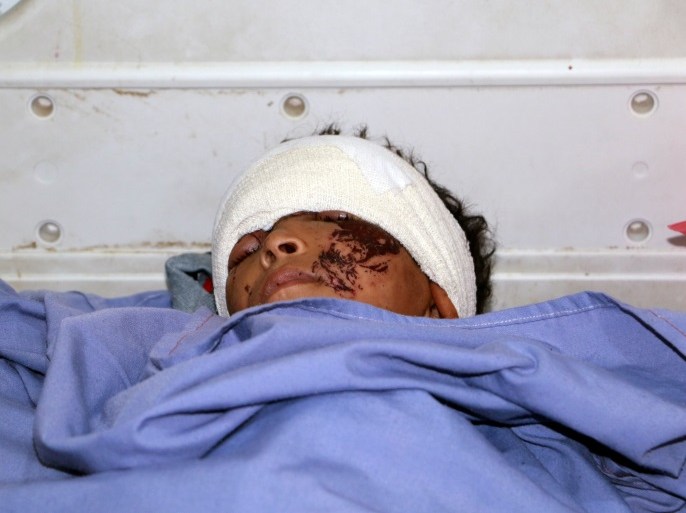 ATTENTION EDITORS - VISUAL COVERAGE OF SCENES OF INJURY OR DEATH A boy injured in Thursday's air strike lies on a hospital bed in Saada, Yemen August 11, 2018. REUTERS/Naif Rahma