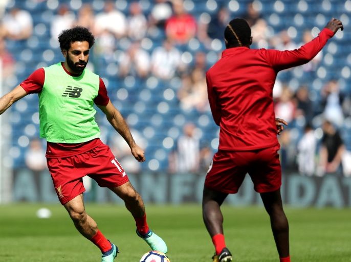WEST BROMWICH, ENGLAND - APRIL 21: Mohamed Salah of Liverpool warms up with Sadio Mane of Liverpool prior to the Premier League match between West Bromwich Albion and Liverpool at The Hawthorns on April 21, 2018 in West Bromwich, England. (Photo by Matthew Lewis/Getty Images)