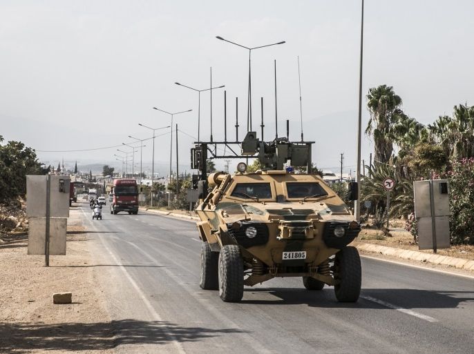 Turkey deploys armored vehicles and concrete blocks to Syrian border- - HATAY, TURKEY - SEPTEMBER 18: Military vehicles belonging to Turkish Armed Forces' are being dispatched to support the units at border in in Hatay, Turkey on September 18, 2018.