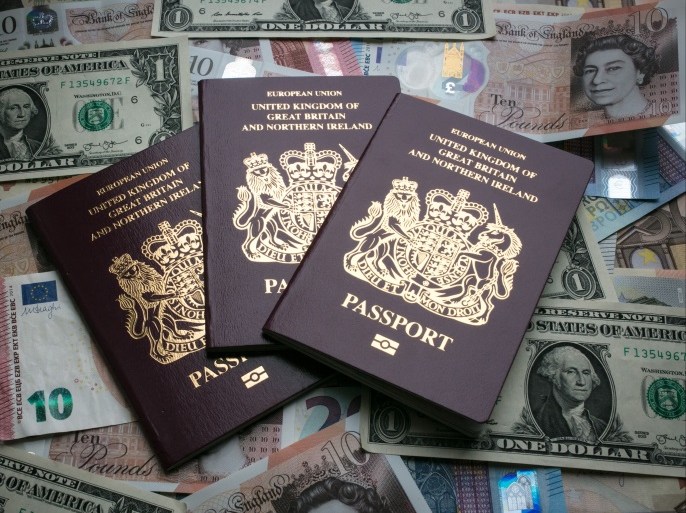 BATH, ENGLAND - OCTOBER 13: In this photo illustration, British passports are placed on currency including the new £10 note, US dollar bills and euro notes on October 13, 2017 in Bath, England. Currency experts have warned that as the uncertainty surrounding Brexit continues, the value of the British pound, which has remained depressed against the US dollar and the euro since the UK voted to leave in the EU referendum, is likely to fluctuate. (Photo Illustration by Matt Cardy/Getty Images)
