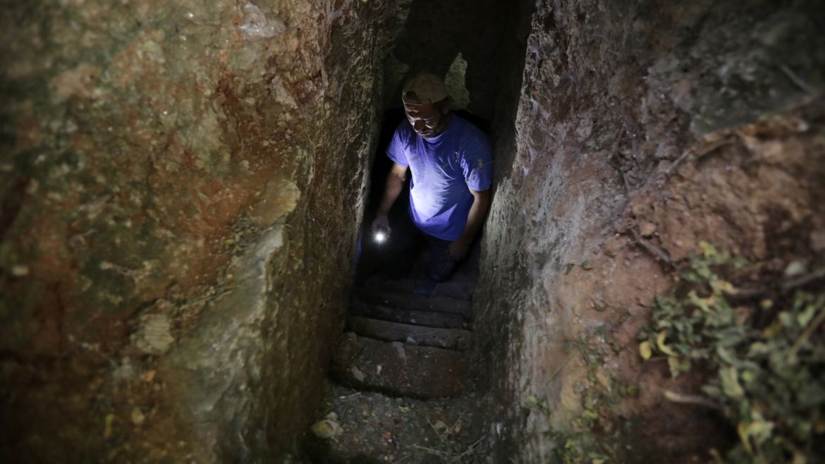 Ahmed Abdulkarim al-Shahad is seen at a makeshift shelter in an underground cave in Idlib, Syria September 3, 2018. Picture taken September 3, 2018. REUTERS/Khalil Ashawi