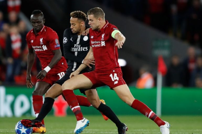Soccer Football - Champions League - Group Stage - Group C - Liverpool v Paris St Germain - Anfield, Liverpool, Britain - September 18, 2018 Paris St Germain's Neymar in action with Liverpool's Sadio Mane and Jordan Henderson Action Images via Reuters/Carl Recine