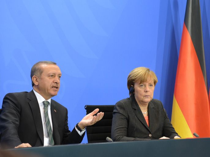 الرئيس التركي رجب طيب أردوغان مع المستشارة أنجيلا ميركل خلال زيارة سابقة له إلى برلين. الجزيرة نت.