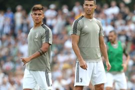 VILLAR PEROSA, ITALY - AUGUST 12: Paulo Dybala and Cristiano Ronaldo of Juventus during the warm up prior to the Pre-Season Friendly match between Juventus and Juventus U19 on August 12, 2018 in Villar Perosa, Italy. (Photo by Marco Luzzani/Getty Images)