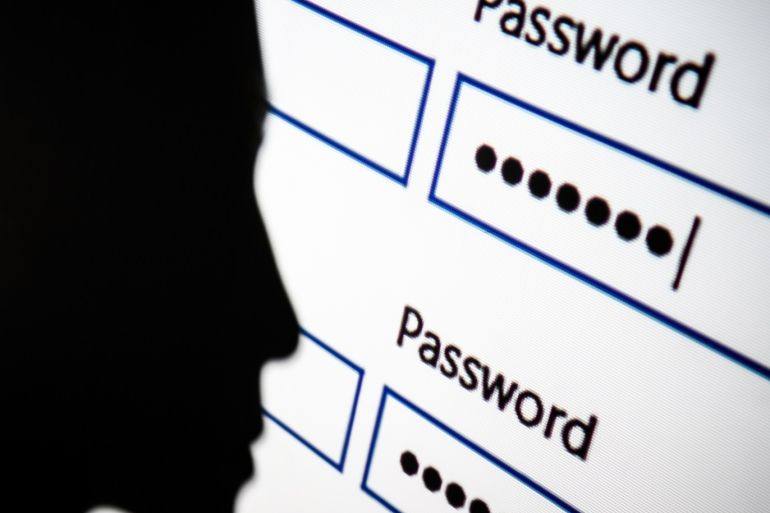 LONDON, ENGLAND - AUGUST 09: In this photo illustration, A woman is silhouetted against a projection of a password log-in dialog box on August 09, 2017 in London, England. With so many areas of modern life requiring identity verification, online security remains a constant concern, especially following the recent spate of global hacks. (Photo by Leon Neal/Getty Images)