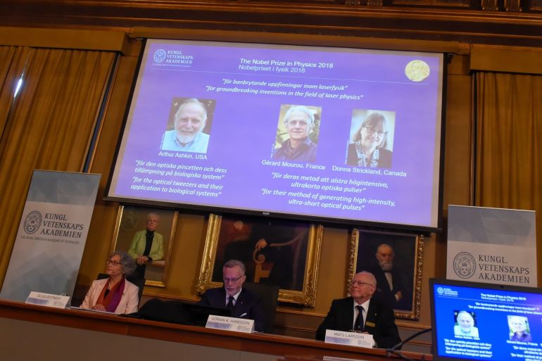 The Nobel Prize laureates for physics 2018 Arthur Ashkin of the United States, Gerard Mourou of France and Donna Strickland of Canada are announced at the Royal Swedish Academy of Sciences in Stockholm, Sweden, October 2, 2018. Hanna Franzen/TT News Agency/via REUTERS ATTENTION EDITORS - THIS IMAGE WAS PROVIDED BY A THIRD PARTY. SWEDEN OUT. NO COMMERCIAL OR EDITORIAL SALES IN SWEDEN.