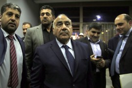 Iraq's parliament elects Barham Salih as president- - BAGHDAD, IRAQ - OCTOBER 2: Independent Shia candidate Adil Abdul-Mahdi (C) is seen after newly elected president Barham Salih (not seen) has given the task to form the government to Adil Abdul-Mahdi at the the Iraqi Parliament building in Baghdad, Iraq on October 2, 2018. Barham Salih, received 219 votes from 272 parliament members winning a clear majority.