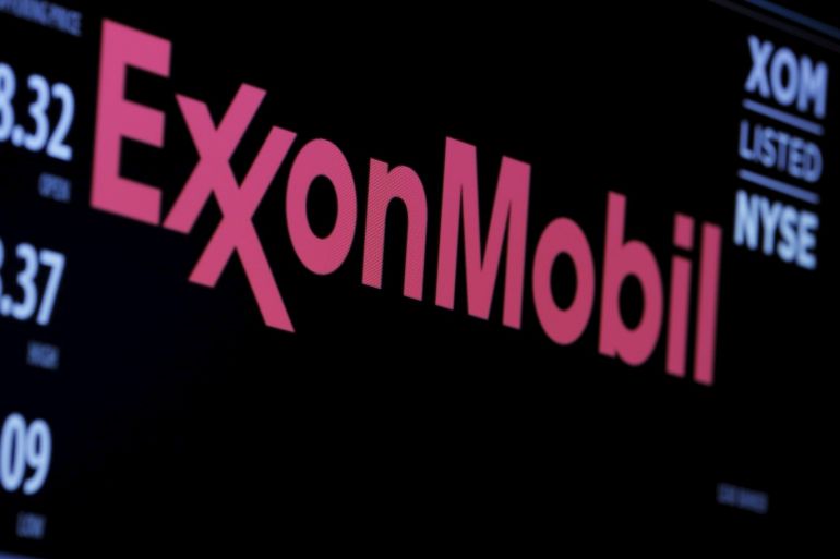 The logo of Exxon Mobil Corporation is shown on a monitor above the floor of the New York Stock Exchange in New York, December 30, 2015. Standard & Poor's Ratings Services said on April 26, 2016, it had cut Exxon Mobil Corp's corporate credit rating to
