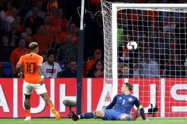 AMSTERDAM, NETHERLANDS - OCTOBER 13: Memphis Depay of the Netherlands scores his sides second goal during the UEFA Nations League A group one match between Netherlands and Germany at Johan Cruyff Arena on October 13, 2018 in Amsterdam, Netherlands. (Photo by Alex Grimm/Bongarts/Getty Images)
