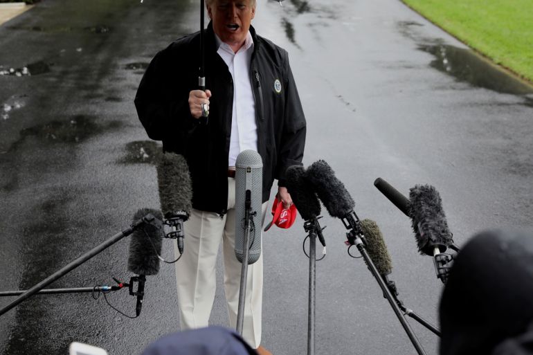 U.S. President Donald Trump talks to reporters as he departs for travel to tour hurricane damage in Florida from the White House in Washington, U.S., October 15, 2018. REUTERS/Jonathan Ernst