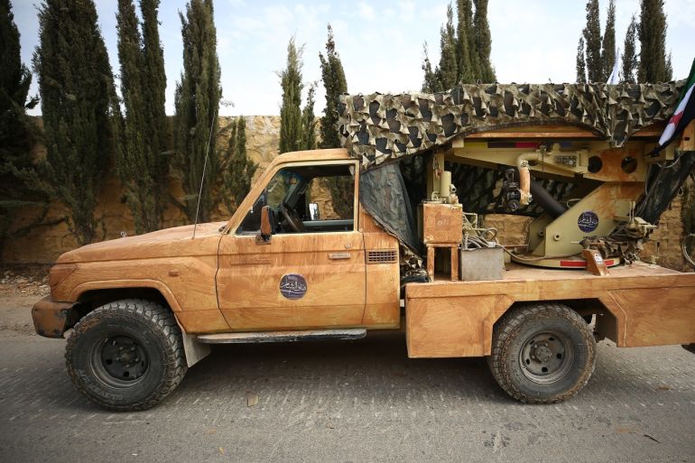 Withdrawal process of heavy weapons in Idlib- - IDLIB, SYRIA - OCTOBER 08: Syrian opposition forces are seen as armoured vehicles and weapons of opposition forces are being withdrawn from Syria's Idlib to complete the establishment of the disarmament field due to the Sochi Agreement, agreed by Turkey and Russia, on October 08, 2018.