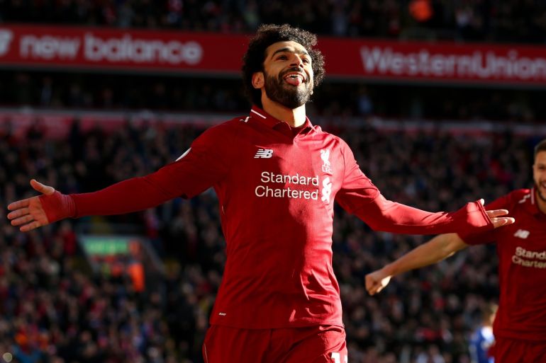 LIVERPOOL, ENGLAND - OCTOBER 27: Mohamed Salah of Liverpool celebrates after scoring his team's first goal during the Premier League match between Liverpool FC and Cardiff City at Anfield on October 27, 2018 in Liverpool, United Kingdom. (Photo by Jan Kruger/Getty Images)