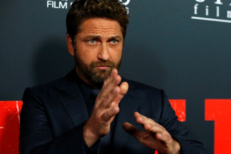 Cast member Gerard Butler poses at the premiere for "Den of Thieves" in Los Angeles, California, U.S., January 17, 2018. REUTERS/Mario Anzuoni