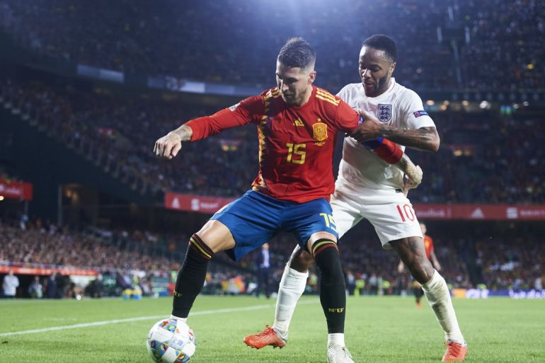 SEVILLE, SPAIN - OCTOBER 15: Raheem Sterling of England duels for the ball with Sergio Ramos of Spain during the UEFA Nations League A Group Four match between Spain and England at Estadio Benito Villamarin on October 15, 2018 in Seville, Spain. (Photo by Aitor Alcalde/Getty Images)