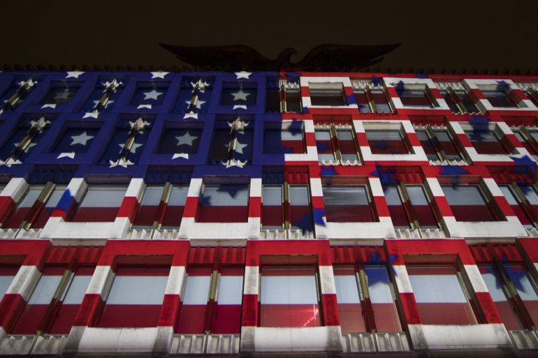 LONDON, ENGLAND - NOVEMBER 08: The American flag is projected on to the United States Embassy during an election night party on November 8, 2016 in London, England. Americans have gone to the polls today, November 8, to elect the 45th President of the United States. Hillary Clinton represents the Democrats and, if successful, would be the first woman president in American history.  Donald Trump represents the Republicans and his campaign has been dogged by bad publicity, despite this the polls show that either of the two contenders could win with the election too close to call. (Photo by Jack Taylor/Getty Images)