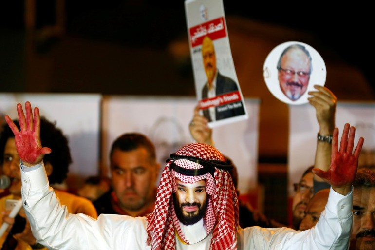 A demonstrator wearing a mask of Saudi Crown Prince Mohammed bin Salman attends a protest outside the Saudi Arabia consulate in Istanbul, Turkey October 25, 2018. REUTERS/Osman Orsal