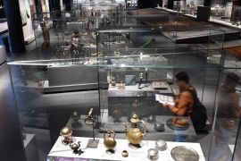 Louvre Museum, Department of Islamic Art- - PARIS, FRANCE - OCTOBER 14: Visitors look to items of Islamic Arts history at the Louvre Museum's (Musee du Louvre) Islamic Art section in Paris, France on October 14, 2018.