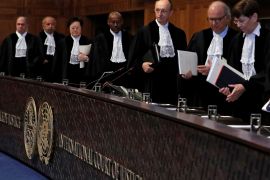 Judges are seen at the International Court of Justice, the U.N.'s highest court for disputes between states, before the ruling on a dispute between Bolivia and neighbour Chile on access to the Pacific Ocean, in The Hague, the Netherlands October 1, 2018. REUTERS/Yves Herman