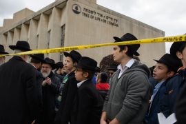 PITTSBURGH, PA - OCTOBER 29: Orthodox Jews gather to hold a prayer session Monday afternoon at the site of the mass shooting that killed 11 people and wounded 6 at the Tree Of Life Synagogue on October 29, 2018 in Pittsburgh, Pennsylvania. Eleven people were killed and six more wounded in the mass shooting that police say was fueled by antisemitism. Jeff Swensen/Getty Images/AFP== FOR NEWSPAPERS, INTERNET, TELCOS & TELEVISION USE ONLY ==