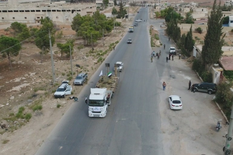 Withdrawal process of heavy weapons in Idlib- - IDLIB, SYRIA - OCTOBER 08: A drone photo shows Syrian opposition forces as armoured vehicles and heavy weapons of opposition forces are being withdrawn from Syria's Idlib to complete the establishment of the disarmament field due to the Sochi Agreement, agreed by Turkey and Russia, on October 08, 2018.